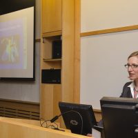 Dr. Brau delivering her presentation at the MGH Gordon Center