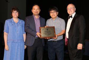 Drs. Quanzheng Li and Kyungsang Kim receiving their AAPM award