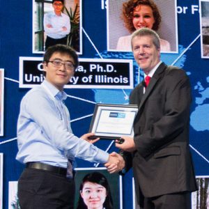Dr. Ma receiving his ISRMR award